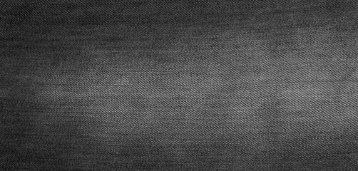 Black denim background. Denim fabric. Top view photo for background. Copy area and text area