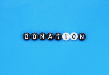 black and white circles with the word donation