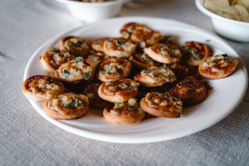Apero beautifully arranged as finger food on plates on a table