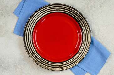 empty clean ceramic plate top view and napkin with copy space for text and dissign, dish template for food