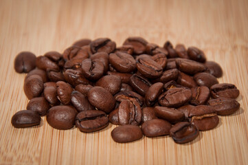 coffee beans on wooden background