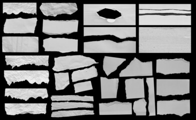 Set of piece torn paper on black. Copy space.