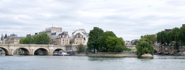 bridge over the Seine  in Paris in a cloudy day. Banner