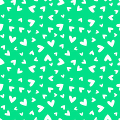 Green seamless pattern with white hearts.