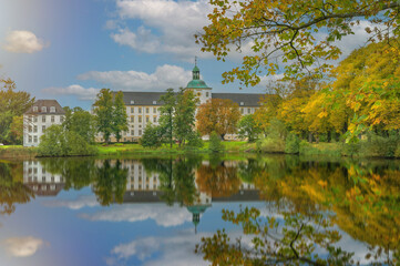 Autumnafternoon in the castle. Autumn park with pond. Castle Gottorf in the city of Schleswig,...