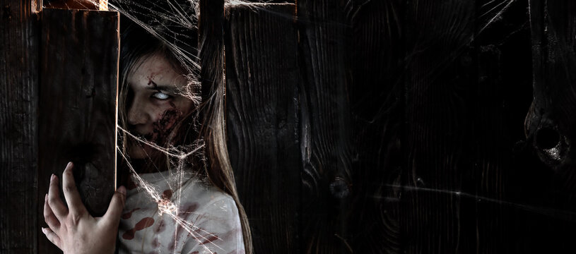 Zombie woman costume and makeup for Halloween Festival. Scary ghost with horror and darkness Scene.
