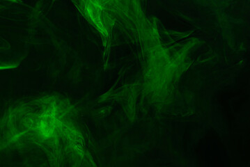 Green steam on a black background.