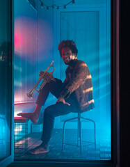 Bare feet trumpet player