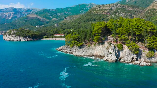 Panoramic view the park Milocer and on a beautiful rock coastline of Montenegro.