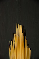 Cropping spaghetti pile on center and black background