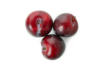 Plums, isolated on white background, top view