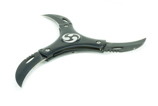 Throwing ninja blades on white