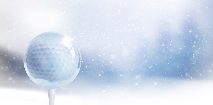 Gläserne Weihnachtskugel mit Golfball vor unscharfem Blauem Hintergrund mit Schneeflocken