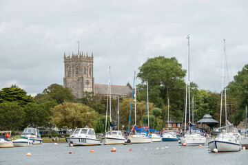 view of Christchurch Priory from across the River Stour Dorset England - obrazy, fototapety, plakaty