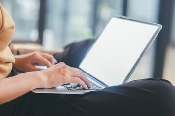 Young collage student using computer and mobile device studying 