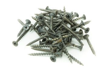 Isolated photo of a pile of screws
