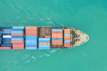 Aerial top view of cargo ship carrying container for import export goods  to customer,concept...