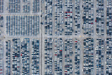 Aerial view New cars parked in ports preparing for export to foreign countries,concept about the automotive industry
