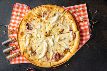 seafood pizza white sauce Takeaway mussel, squid, octopus, shrimp cheese fast food fresh meal snack on the table copy space food background rustic 