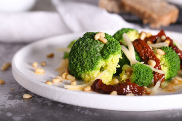 salad of broccoli dried tomatoes pine nuts and cheese