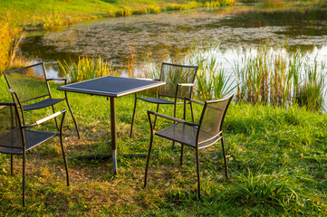 table near a pond