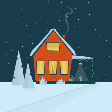 A red cozy house with a roof in the snow with Christmas trees in a snowy courtyard . 
