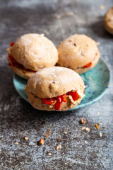 Walnut sandwich with hummus and red peppers. Vegan sandwich with hummus