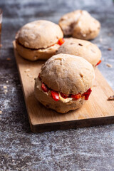 Walnut sandwich with hummus and red peppers. Vegan sandwich with hummus