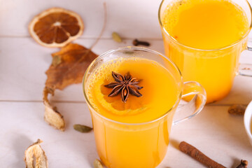 Tea with sea buckthorn and spices is on the table