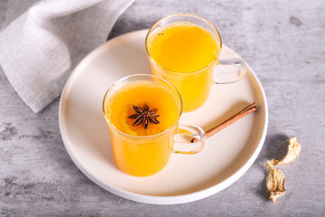 Tea with sea buckthorn and spices is on the table