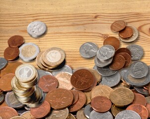 A collection of vintage coins on display at a market