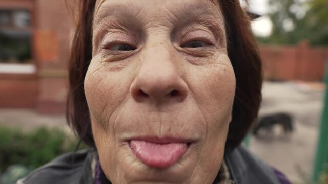 Elderly woman making funny face