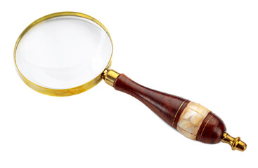 Antique magnifying glass with a wooden handle decorated with mother-of-pearl.