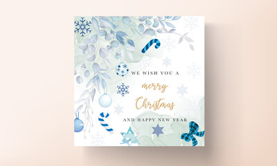 elegant white christmas card design with leaves and christmas ornament