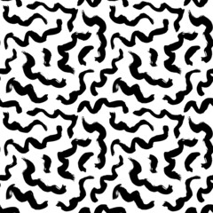 Fototapeta na wymiar Wavy and swirled brush strokes vector seamless pattern. Black paint freehand scribbles, abstract ink background. Brushstrokes, smears, lines, squiggle pattern. Abstract wallpaper design, textile print
