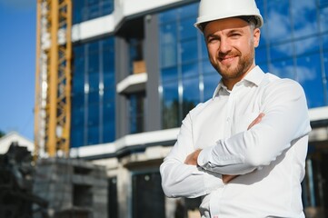 A construction worker control in the construction of roof structures on construction site and...