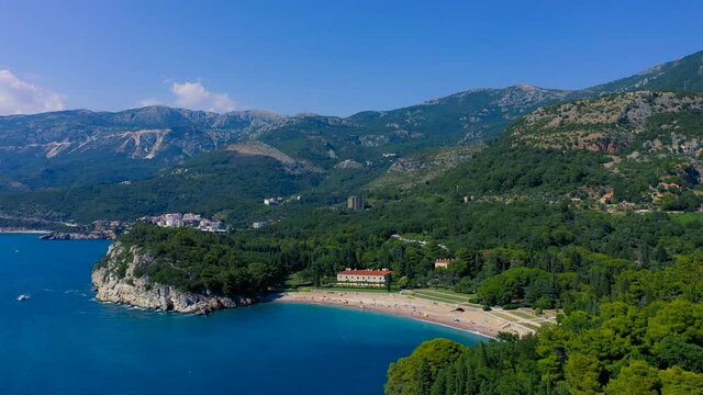 The park Milocer, Villa Queen. Near the island of Sveti Stefan in Montenegro. Aerial drone view 4K.