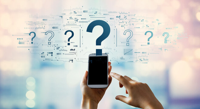 Question marks with person using a smartphone