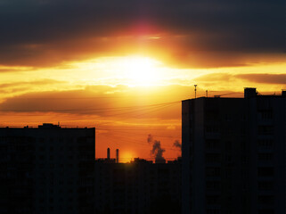 Sunset at sleeping industrial district in Moscow background