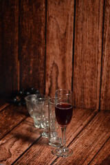 Bottles and glasses with wine on the table. Wine culture concept.