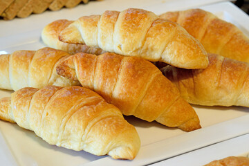 Fresh croissants  on a plate in breakfast