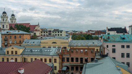 Tile roofs over historical city center. Top view of the historic part of Minsk, Belarus.