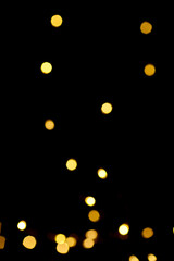 Blurred light bokeh on black