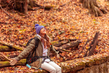Woman relaxing outdoors on a sunny autumn day
