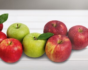 Group of tasty sweet fresh Apple on wooden board background, Fruits concept.
