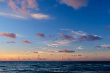 Beautiful colored cloudy evening sky.  Seascape.