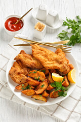 crispy Chicken Cutlets with spicy roasted potatoes