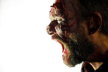 Zombie male profile view for halloween concept on white background