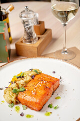 salmon steak with cauliflower and herbs