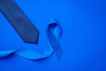 Blue ribbon. Awareness prostate cancer of men health in November. Blue ribbon, fashion tie isolated...
